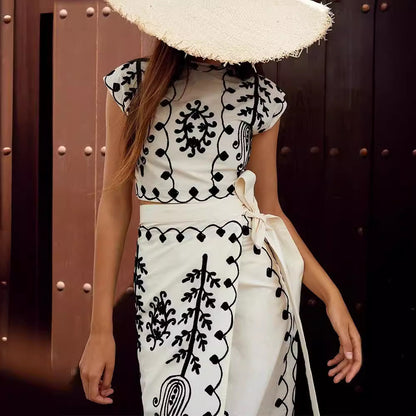 Two printed resort-style suit skirts